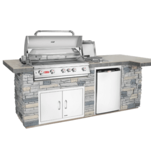 Stock Image - Bull Grills - BBQ Outdoor Kitchen with Faux Rock and Brahma Grill head Bull Grills - Dunrite Chimney and Stove